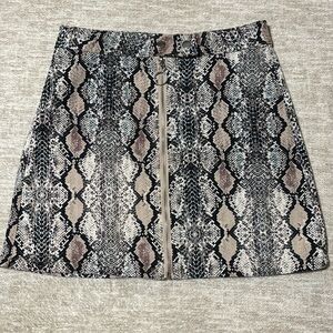 Altar'd State Medium snake print mini skirt denim type material